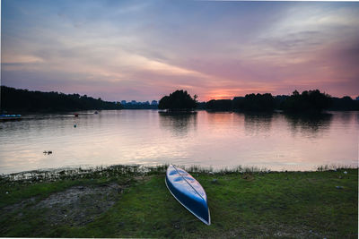 Scenic view of lake against sky during sunset