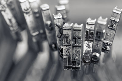 High angle view of text on metal grate