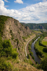 High angle view of road amidst landscape against sky