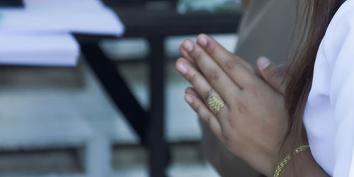 Close-up of woman using mobile phone