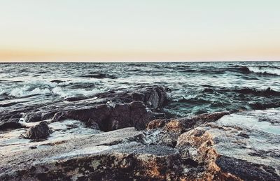 Scenic view of sea at sunset