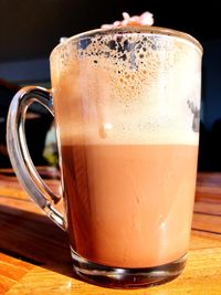 Close-up of coffee served on table