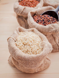 Close-up of rice in canvas bags