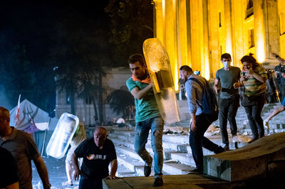 Group of people standing in front of building