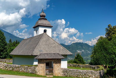 View of building against cloudy sky