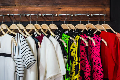 Close-up of multi colored clothes hanging on rack