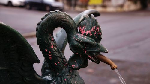 Close-up of statue against blurred background