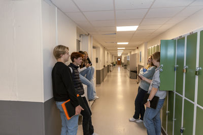 Teenage kids in school locker room