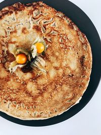 High angle view of eggs in plate