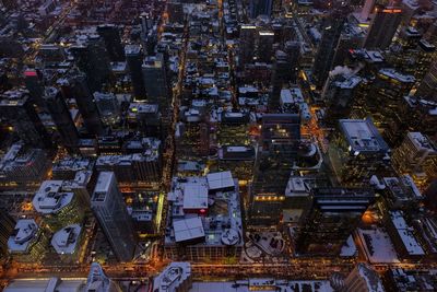 High angle view of city buildings at night