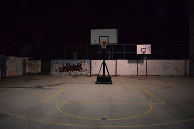 View of basketball hoop at night