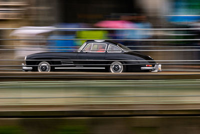 Side view of car on road