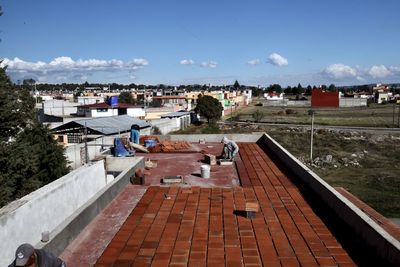 High angle shot of townscape against sky