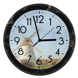 Close-up of clock over white background