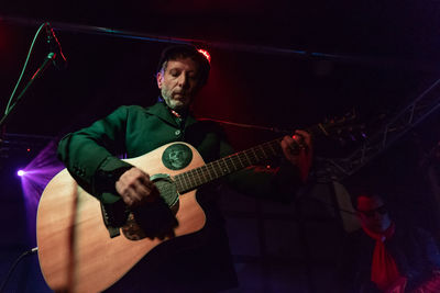 Young man playing guitar