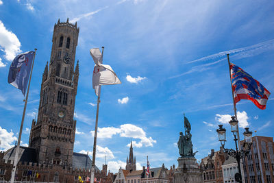 Low angle view of buildings in city against sky