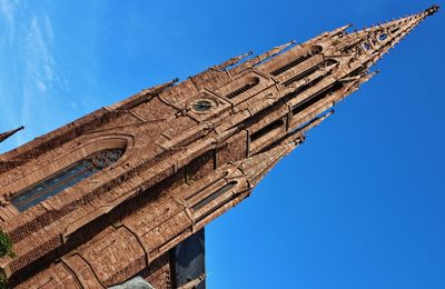 Tilt image of historic cathedral against sky