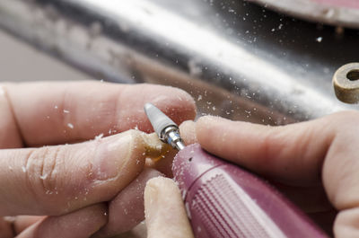 Close-up of the hands of a dentist