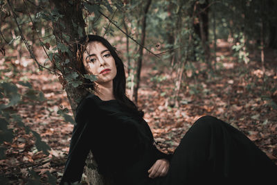 Portrait of beautiful woman in forest