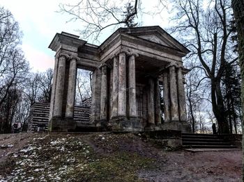 Low angle view of old temple against sky