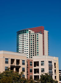 Low angle view of building against clear blue sky