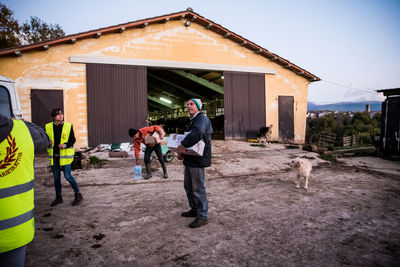 People working on building