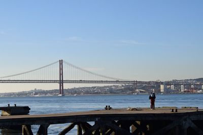 View of suspension bridge in city