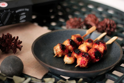 High angle view of meat on barbecue grill