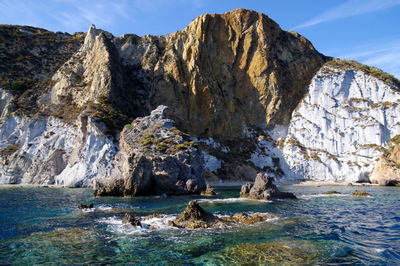 Scenic view of mountains and sea against sky