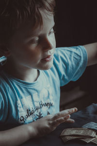 Small boy playing a game