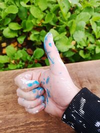 Close-up of woman hand on finger