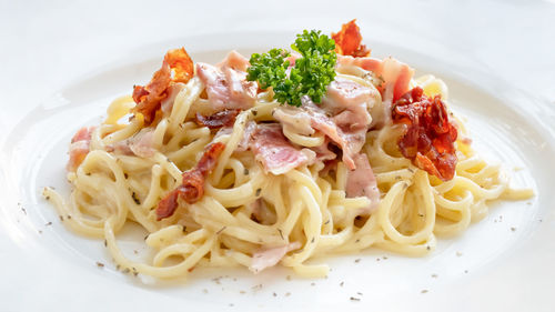 Close-up of noodles served in plate