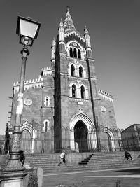 Low angle view of bell tower against sky