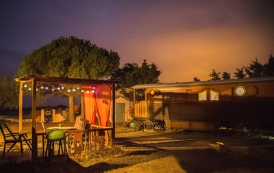 Table and chairs at night