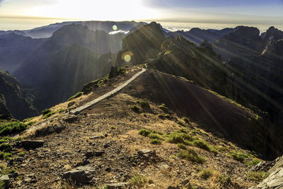 Scenic view of mountains during sunny day