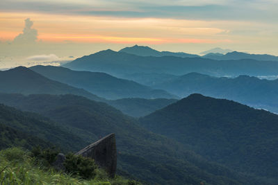 Scenic view of mountains against sky during sunset