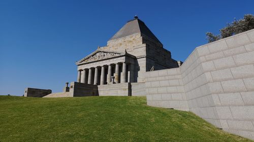 Low angle view of historical building against clear sky