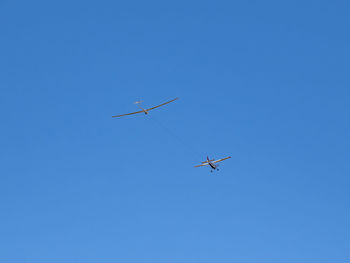 Glider plane flying during a takeoff