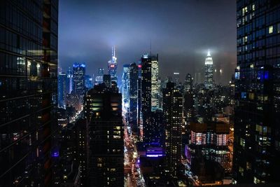 Illuminated cityscape at night