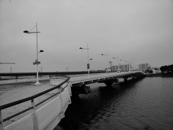 Bridge over river against clear sky