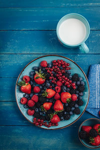 High angle view of strawberries in bowl on table