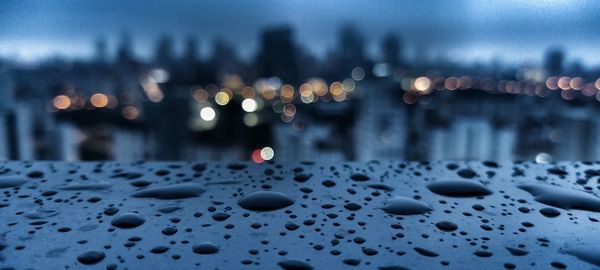 Close-up of wet car on rainy day