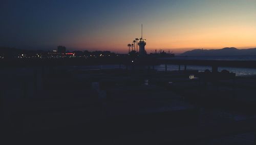 Scenic view of mountains against sky at dusk