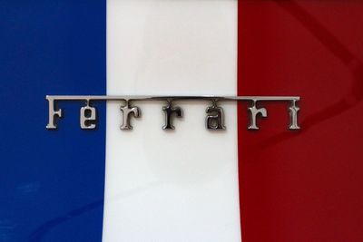 Close-up of text on white wall