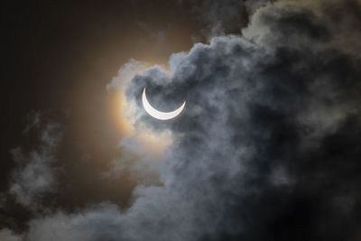 Low angle view of moon against sky at night