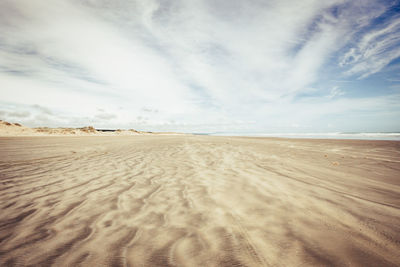 Scenic view of desert against sky