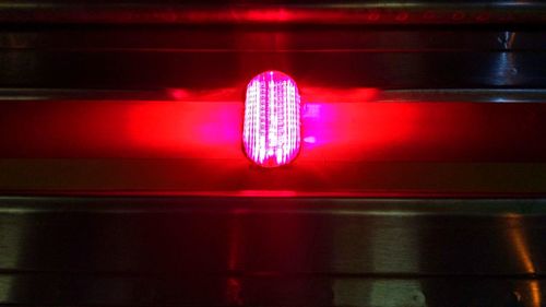 Close-up of illuminated red lights