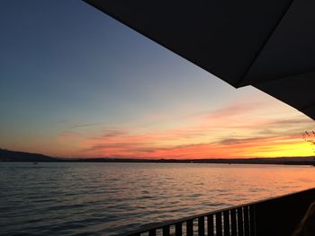 Scenic view of sea at sunset