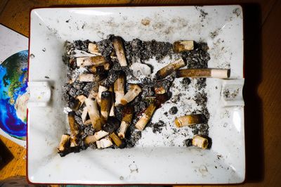 Close-up of cigarette on table