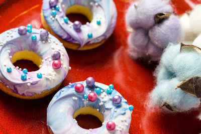 High angle view of multi colored eggs on table